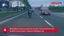 Motosikleti yatarak kullandı