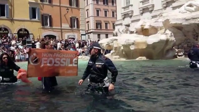 Rome’s Trevi Fountain turns black in climate protest against fossil fuels