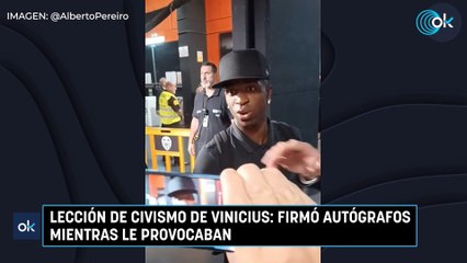 Lección de civismo de Vinicius: firmó autógrafos mientras le provocaban