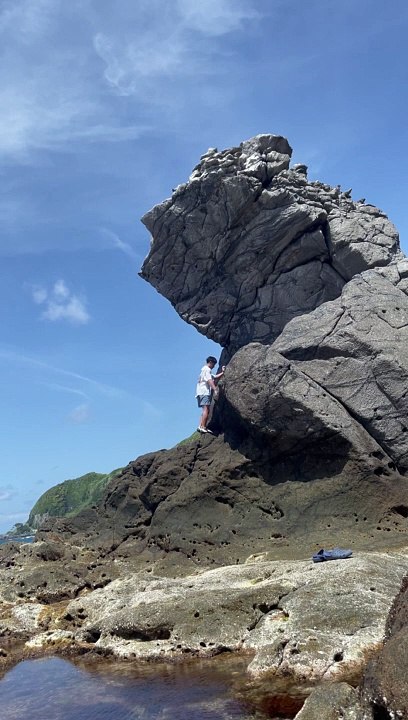 Man Climbing Rocks Falls And Injures Himself