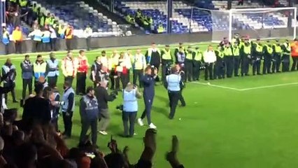 Sonny Bradley applauds the Luton Town fans