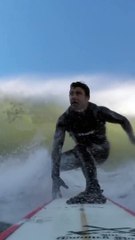 Slow motion dangerous close-up while surfing