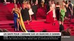 Festival de Cannes: Une femme vêtue aux couleurs de l'Ukraine a fait irruption sur le tapis rouge pour s'y recouvrir de faux sang avant d'être évacuée par la sécurité - Regardez