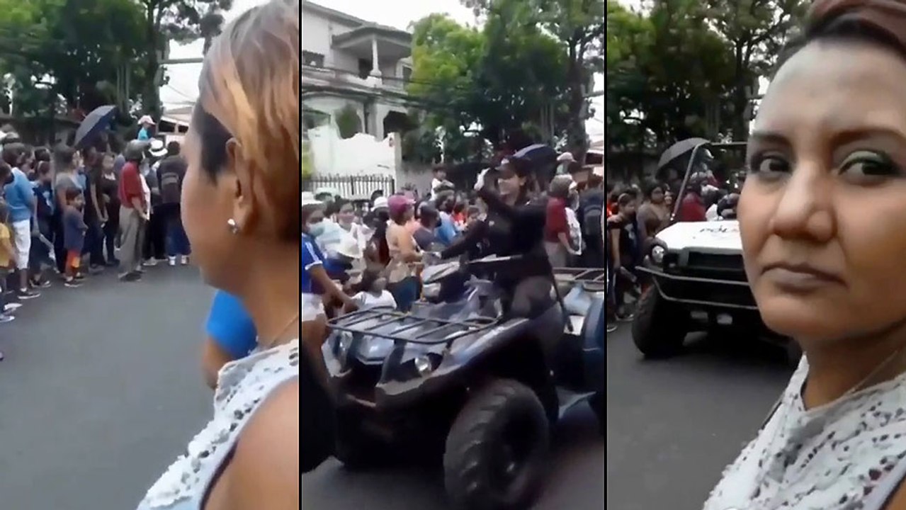 Un homme crie "Arrête Moi" devant sa femme