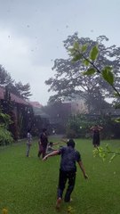 Giggling Together In The Rain