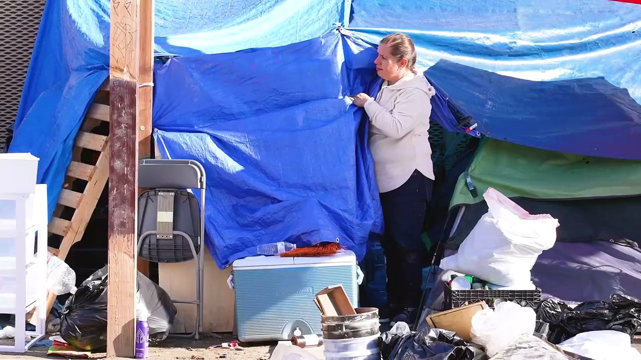 Homeless Sweep Left Woman with Only a Backpack