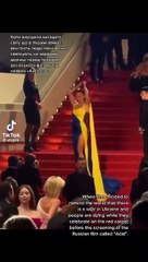 Mulher cobre-se de \'sangue\' em protesto antiguerra no Festival de Cannes
