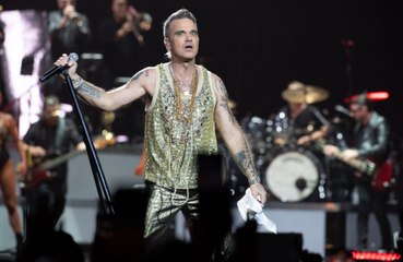 Robbie Williams has written a new song about the nasty comments he reads about himself