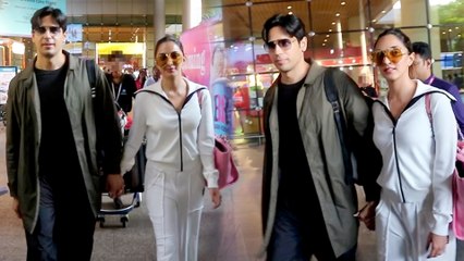 Sidharth And Kiara Walking Hand-In-Hand At Airport