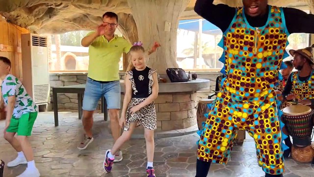 Diana and Roma feed the animals at the Emirates Park Zoo
