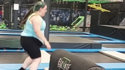 Woman enjoying her time in a trampoline park fails hard *Hilarious fail*