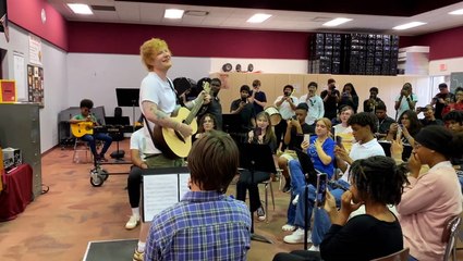 High school band plays ‘Eyes Closed’ to Ed Sheeran as he surprises them with free guitars and tickets