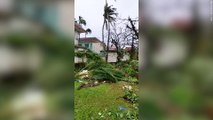 Power out and trees down after Typhoon Mawar sweeps across Guam