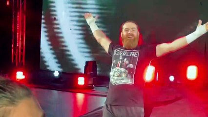 Sami Zayn rips up little kids first wrestling match sign!!