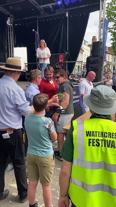 Watercress eating world champion Glenn Walsh lifts the trophy