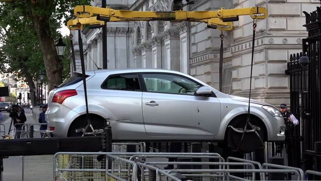 Watch: Police remove car after it crashed into Downing Street gates