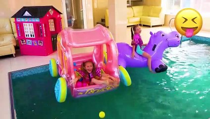 Sasha plays with Water Slides and finds inflatable Toys in Surprise Eggs (1)