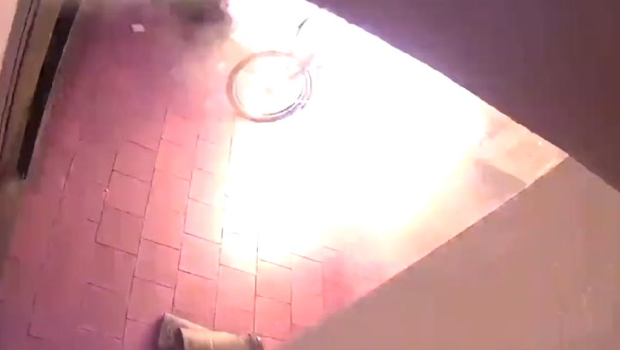 Dramatic CCTV shows man running for cover as e-bike battery explodes into flames
