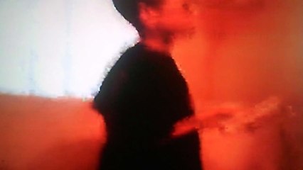 Jonathan playing wii then Christopher comes up