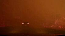 Car drives through raging Canadian wildfire in dramatic dashcam footage