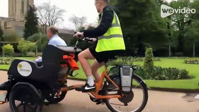 SuffolkNews reporter Cameron Reid volunteering with the Bury St Edmunds Rickshaw