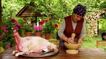 COOKING OF STUFFED LAMB IN MUD OVEN