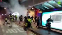 Tear gas used amid chaos in Hong Kong as police clash with protesters at train station