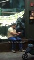Guy shows gorilla photos on his phone