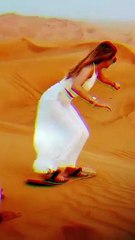 sandboarding at Dubai Safari desert