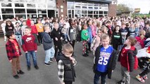 Pupils from Crestwood Park Primary School, Kingswinford, sing to celebrate fifty years of the school.