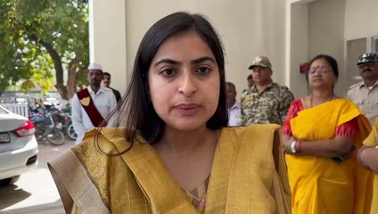 Collector put stickers on vehicles to make voters aware