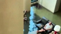 Oblivious Hotel Guest Sits in Lobby Flooded by Tropical Depression Imelda