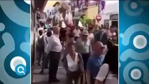 Mujer cae mal durante desfile