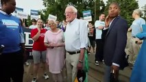 Bernie Sanders walks in Iowa Fourth of July parade