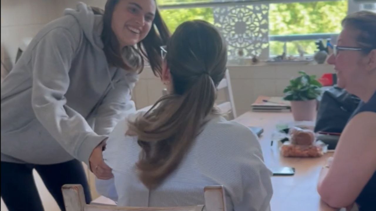 Woman brings mom to the verge of crying happy tears with her surprise return from abroad