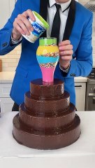 When he lifts the cup, the WEDDING CAKE becomes so COLORFUL