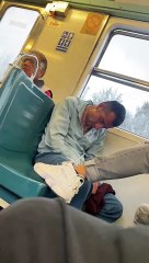 Sleeping Man on Train Falls Out of His Chair