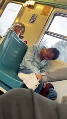 Sleeping Man on Train Falls Out of His Chair