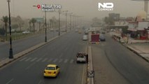 شاهد: سماء الموصل تكتسي باللون الأصفر بسبب عاصفة رملية شديدة ضربت المدينة