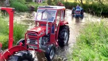 Tractors crossing the ford during the Tamlaght O'Crilly District tractor run