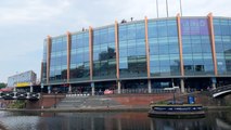 Pro golfer Richard Mansell attempts a trick shot off the roof of Utilita Arena Arena Birmingham ahead of the Betfred British Masters