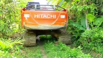 Hitachi 210 MF Excavator in Action When Passing Through Trenches