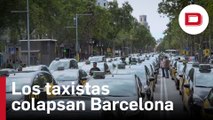 Los taxistas de Barcelona colapsan el centro de la ciudad para protestar contra las licencias de VTC