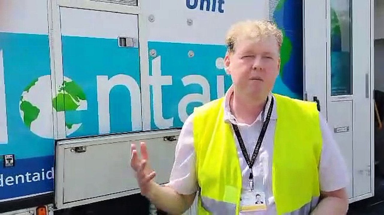 Cllr Towill explains the need for the dental charity visit