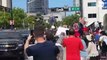 Man tackled, arrested after running in front of Trump's motorcade | USA TODAY