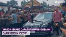 Momen Presiden Jokowi Bagi-Bagi Sembako dan Kaos di Menteng Pulo
