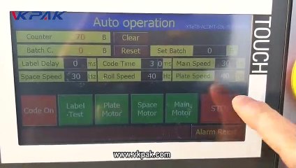 ماكينة لصق استيكر, آلة وضع العلامات على الزجاجات المستديرة