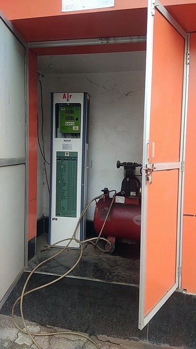 Nehru Nagar electricity office surrounded by residents including councilor