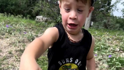 Excitement turns into sheer panic after kid realizes that the fish in his hand is ALIVE