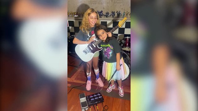 Young siblings rock out on drums and guitar - aged ten and eight